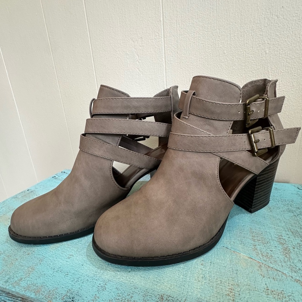 Boots with large cut outs, size 10
